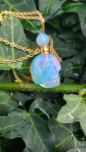 Load image into Gallery viewer, Crystal Skull Necklaces filled with essential oils that bring positive energy. Opal

