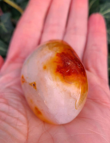 Calming Carnelian Palm stone to help get rid of anger and keep you grounded