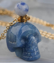 Load image into Gallery viewer, Crystal Skull Necklaces filled with essential oils that bring positive energy.
